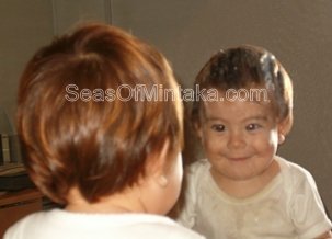 Baby in mirror